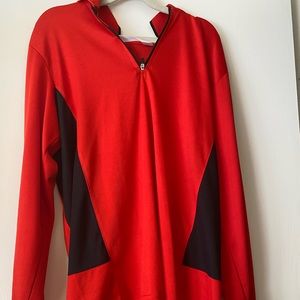 red and black women’s horseback riding shirt. worn few times. great condition.